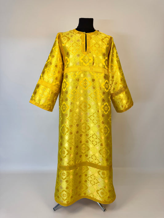 Yellow brocade stychar on a mannequin against